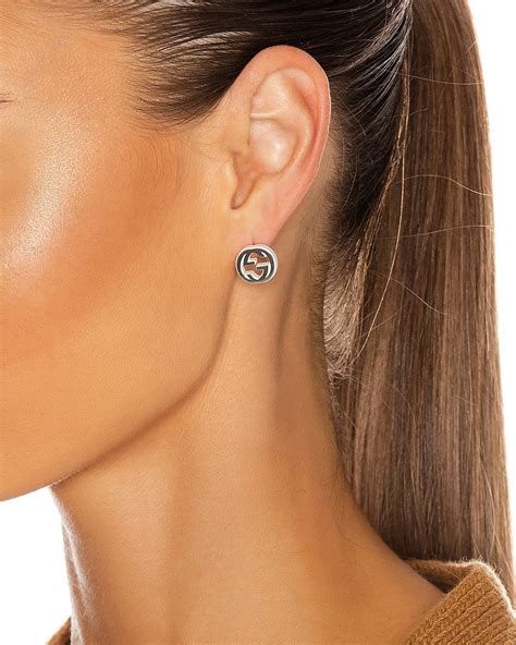 gucci interlocking earrings on ear|interlocking g earrings in silver.